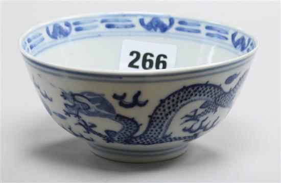 A Chinese blue and white dragon bowl
